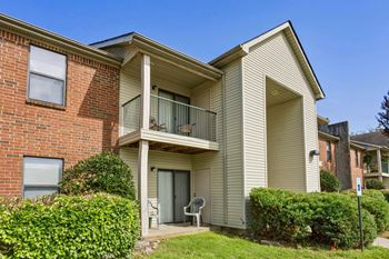Patio or balcony with exterior storage area